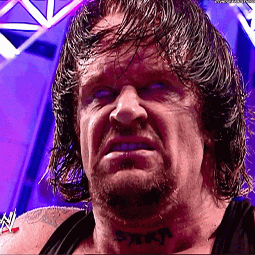 the-undertaker-tongue-out.gif